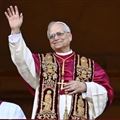 The new pope, Cardinal Robert Francis Prevost, who has chosen the name Leo XIV, blesses the faithful at St. Peter's, May 8, 2025 (© Ansa/Vatican Media)